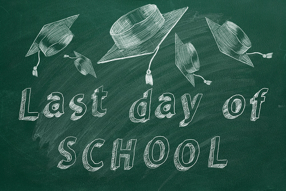 Chalkboard illustration with white chalk drawings of four graduation caps thrown in the air and the phrase "Last day of SCHOOL" written in large, playful text. The background has chalk smudges, adding to the celebratory and casual atmosphere.